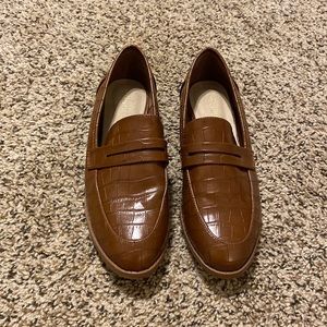 Brown flat loafers